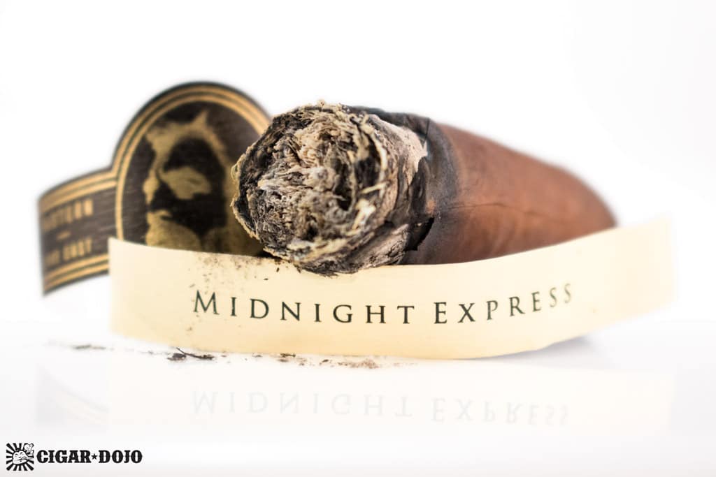 Caldwell Eastern Standard Maduro Midnight Express Jockey Club Robusto cigar nub
