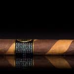 Quesada Reserva Privada Barber Pole Robusto cigar side view