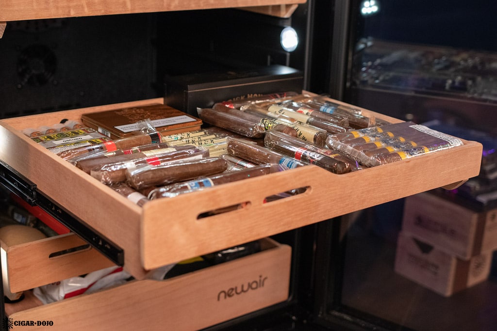 Newair NCH1K5BK00 1500 count humidor extended shelf filled with cigars