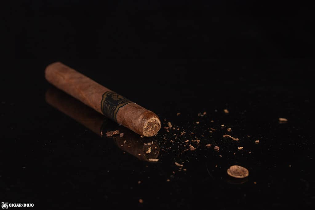 Micallef Black Toro cigar head cut cap