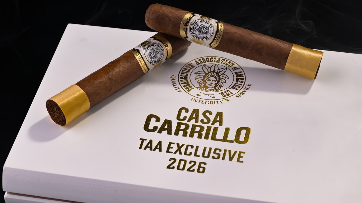 Two Casa Carrillo 2026 TAA Exclusive cigars resting on the white box
