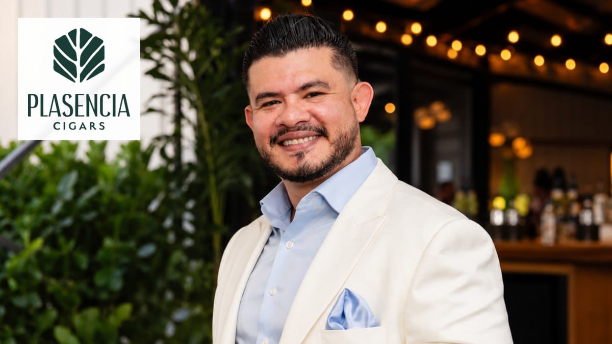 Javier Carranza with the Plasencia Cigars logo